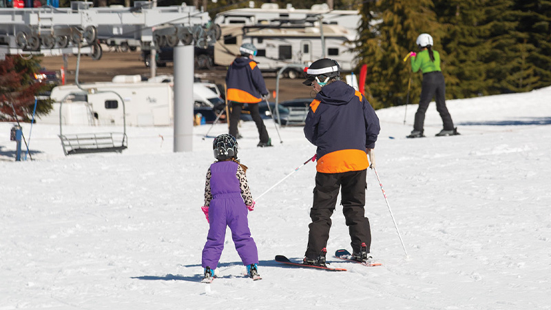 instructor with young student